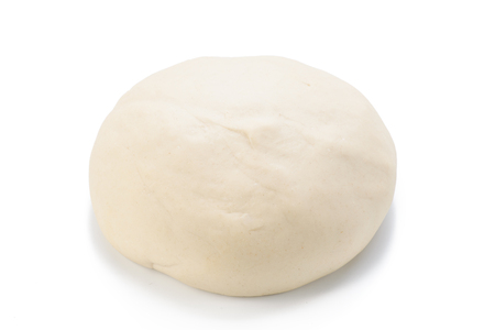 Ball of raw dough isolated on white background. Top view.の写真素材