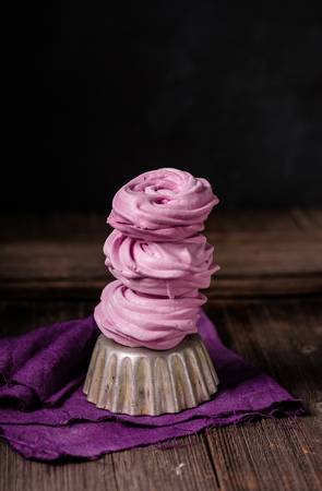 Russian marshmallows, zephyr on wooden table. Still life.の写真素材