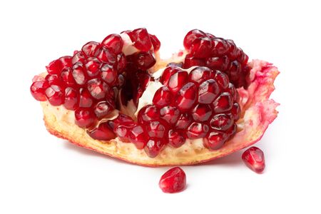 Ripe pomegranate fruit isolated on white background. Grains.の写真素材