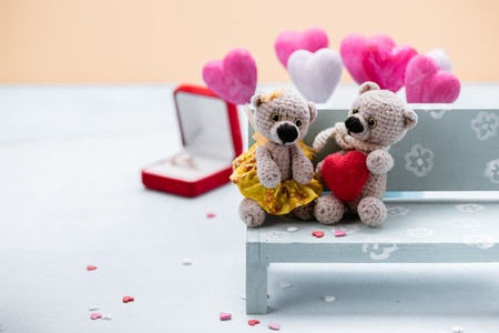 Valentines Day. Love heart. Couple Teddy Bears. Handmade toys. An offer of marriage. Vintage retro romantic style. Family, wedding and friendshipの写真素材