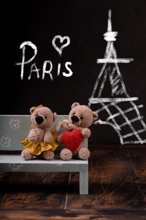 Valentines Day. Love heart. Paris. Couple Teddy Bears. Handmade toys. An offer of marriage. Vintage retro romantic style. Family, wedding and friendship. Chalkboard with chalk.の写真素材