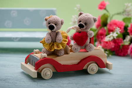 valentines day love heart couple teddy bears on the car handmade toys an offer of marriage vintage retro romantic style family wedding and friendshipの写真素材