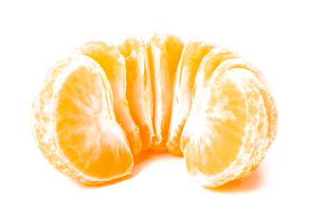 isolated tangerine or clementine fruit on white background macro slice of mandarinの写真素材
