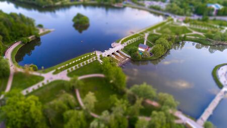 Aerial view of Tsritsyno lake with a dam - Moscow city in Russia. Park. Tilt-shift effect applied.の写真素材