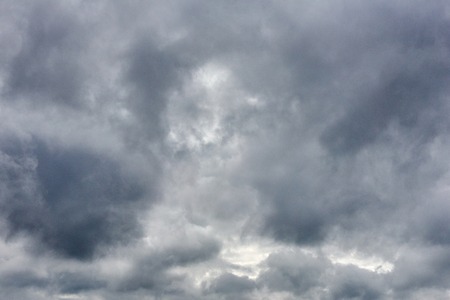 Gray cloud sky. Rainy cloud, gray color backgroundの写真素材