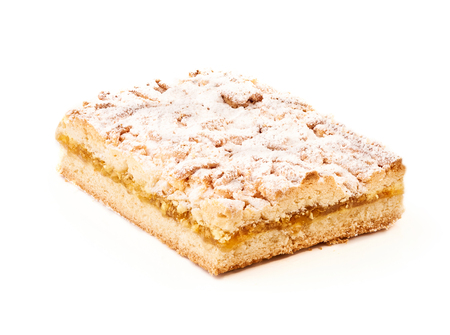 Lemon pie topped with sugar powder on white background. Macro photography with great depth of field. DoF .の写真素材