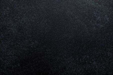 Black concrete background. Top view.