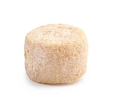 Crottin cheese isolated on white backgroundの写真素材