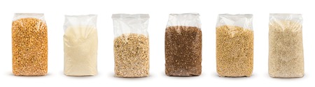 Set of Plastic transparent bags with full of groats isolated on white background. Packages with peas, semolina, rice, seeds, buckwheat grain, oat flakes. Mockup.の写真素材