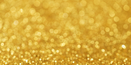 Gold bokeh background of glitter lightsの写真素材