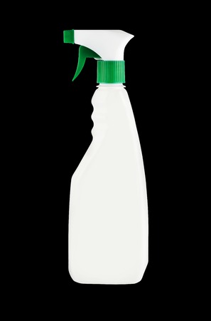 Spray bottle isolated on black backgroundの写真素材