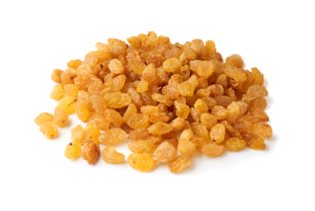 Heap of yellow raisins isolated on white backgroundの写真素材