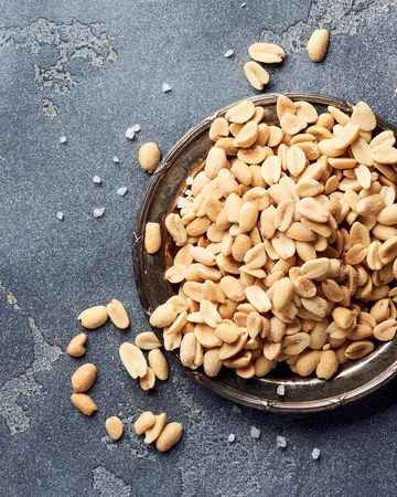 Dried pomelo slices on gray concrete background. Top view of candied fruitsの写真素材