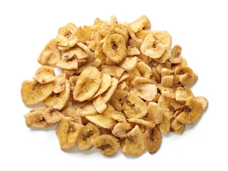 Banana chips slices isolated on a white background. Top view.の写真素材