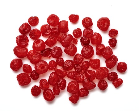 Dried cherries isolated on white background. Top view of candied berries.