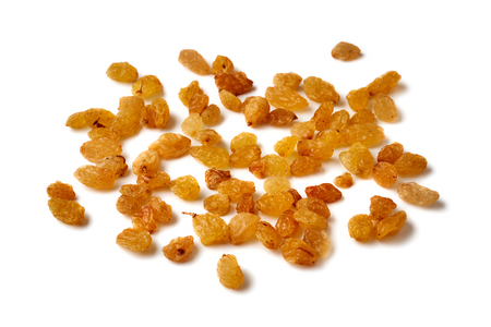 Yellow raisins isolated on white backgroundの写真素材