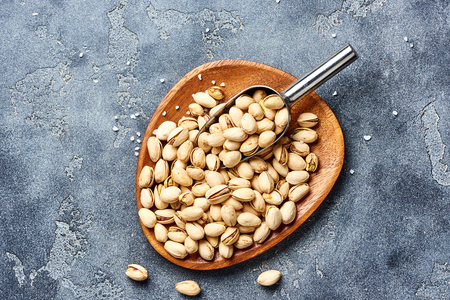 Salted Pistachios nuts. Top view of snacks.の写真素材