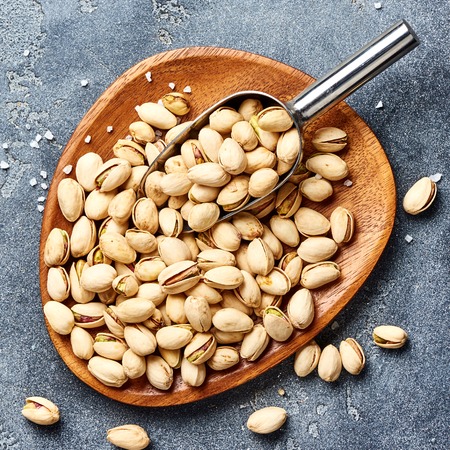 Salted Pistachios nuts. Top view of snacks.の写真素材