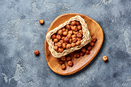 Hazelnuts on gray background. Top view of nuts.の写真素材