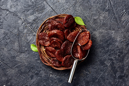 Dried apricots on gray background with copy space. Top view.の写真素材