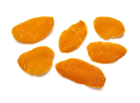 Dried mango slices isolated on white background. Top view.の写真素材