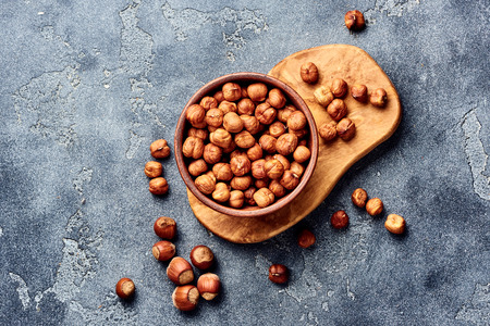 Hazelnuts on gray background. Top view of nuts.の写真素材