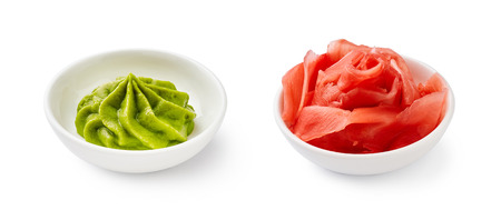 Wasabi and pickled ginger in bowls isolated on white background.の写真素材