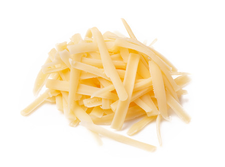 Grated cheese isolated on white background. Slices cheese.の写真素材
