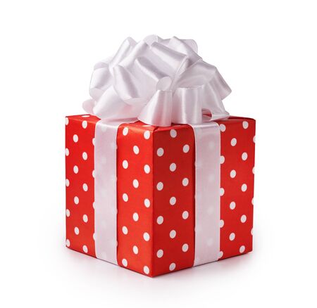 Beautiful decorative red gift box with white bow. Happy Womens Day or Christmas and New Years Day.の写真素材