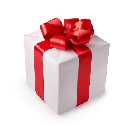Beautiful white gift box with red bow. Happy Womens Day or Christmas and New Years Day.の写真素材