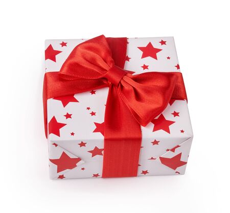 Beautiful white gift box with red bow. Happy Womens Day or Christmas and New Years Day. Top view.の写真素材