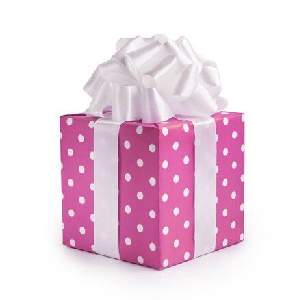 Beautiful decorative pink gift box with white bow. Happy Womens Day or Christmas and New Years Day.の写真素材