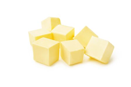 Pieces of butter isolated on white background. Butter cubes.の写真素材
