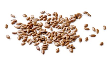 Flax seeds isolated on white background.の写真素材