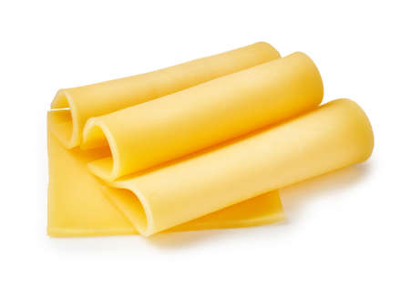 Cheese slices isolated on white backgroundの写真素材