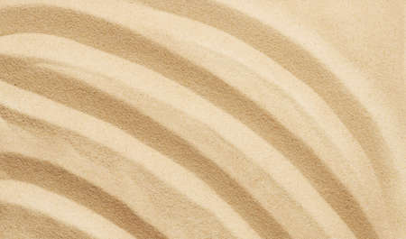 Tropical sand background with sand waves. Sandy beach texture. Top viewの写真素材