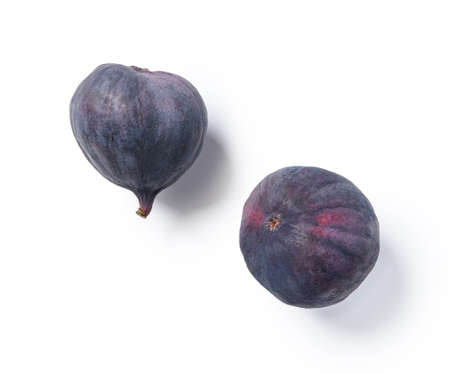 Two fig fruits isolated on white. Top view of figs.の写真素材