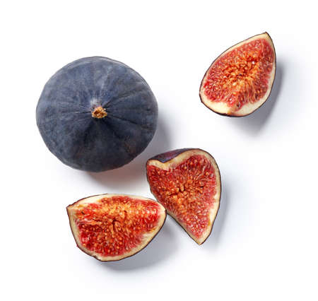 Fig fruit isolated on white background. Top view of fig slicesの写真素材