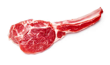 Slice of mutton meat isolated on white. Top view of mutton steak.の写真素材