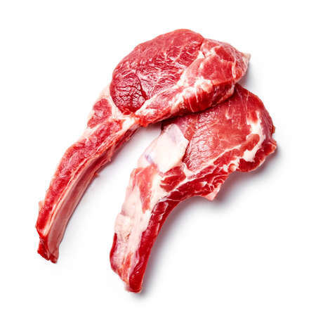 Two slices of mutton meat isolated on white. Top view of mutton steaks.の写真素材