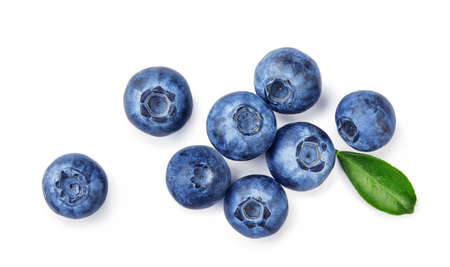Fresh blueberries with bluberry leaves isolated on white background. Top vew of berries.の写真素材