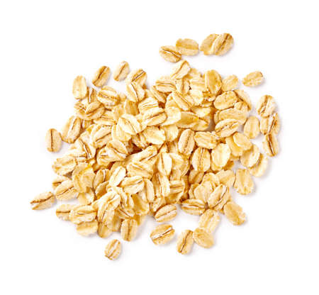 Oat flakes isolated on white background. Flakes for oatmeal and granola. Perfect image of oat flakes for you design.の写真素材