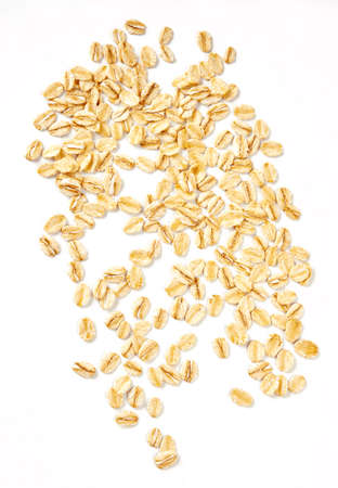 Oat flakes isolated on white background. Flakes for oatmeal and granola. Image of oat flakes for you design.の写真素材