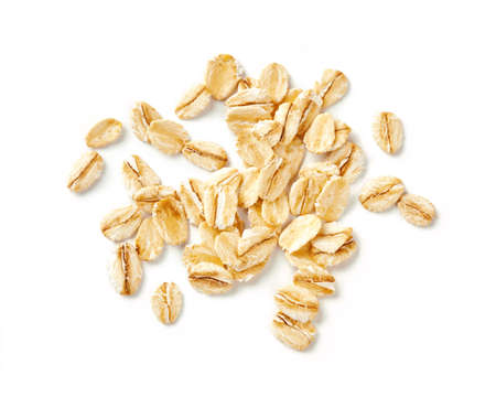 Oat flakes isolated on white background. Flakes for oatmeal and granola. Image of oat flakes for you design.の写真素材
