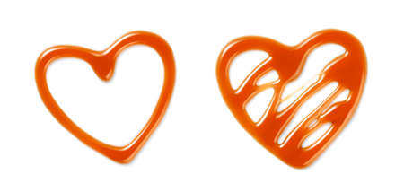 Sweet caramel sauce on white background. Top view of caramel hearts isolated. Caramel sauce for package design.の写真素材