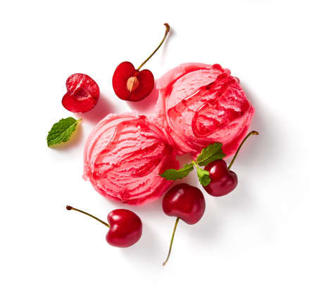 Cherry ice cream with cherry berries on white background. Pink ice cream with cherry sauce isolated for package of ice cream.の写真素材