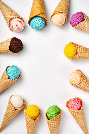 Assorted of ice cream in cones on white background. Colorful set of ice cream of different flavours. Ice cream isolated.の写真素材