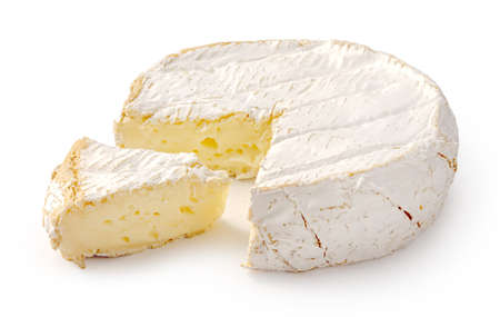 Fresh camembert cheese with sliced camembert isolated. Camembert cheese piece on white background.の写真素材