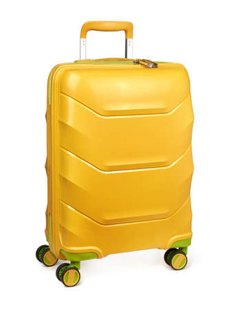 Yellow suitcase isolated on white backgroundの写真素材
