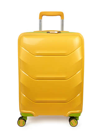 Yellow suitcase isolated on white backgroundの写真素材